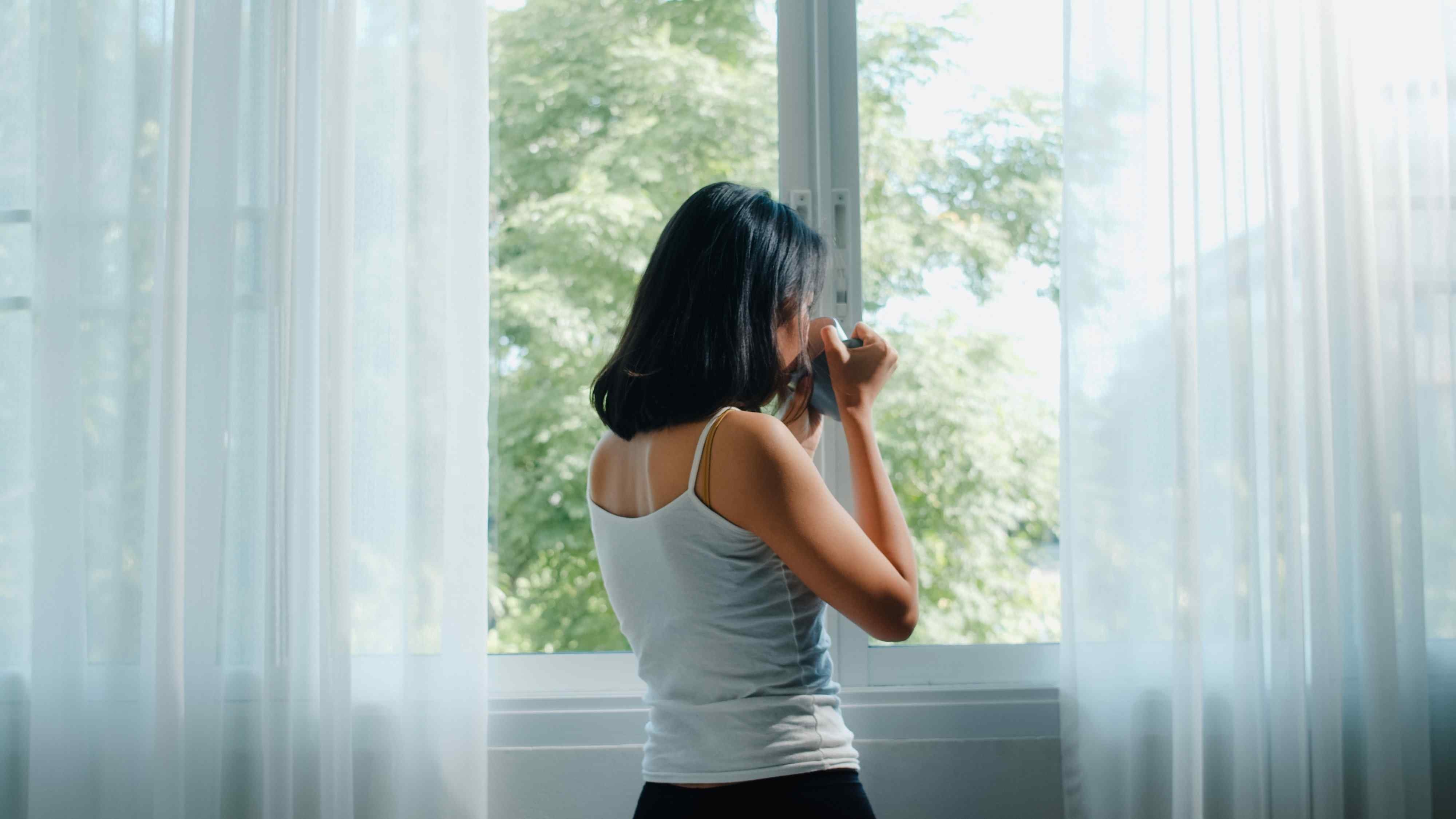 woman,window,curtains
