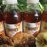 Tins oranics pure honey