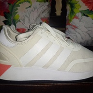 For women- white Adidas shoes