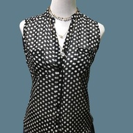 Sleeveless v-neck polka blouse