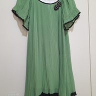 Green dress with brooch