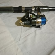 White Rabbit Fishing Rod made in Korea.Korea. Great for beginners' fishing hobby.  Not too heavy for good griping.. like
