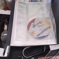 Dvd with song book tape and remote mike with hair style only 2k