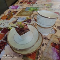 Gold and Silver Embossed Footed Coffee or Tea Cup and Saucer Set