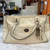Authentic Coach in white leather